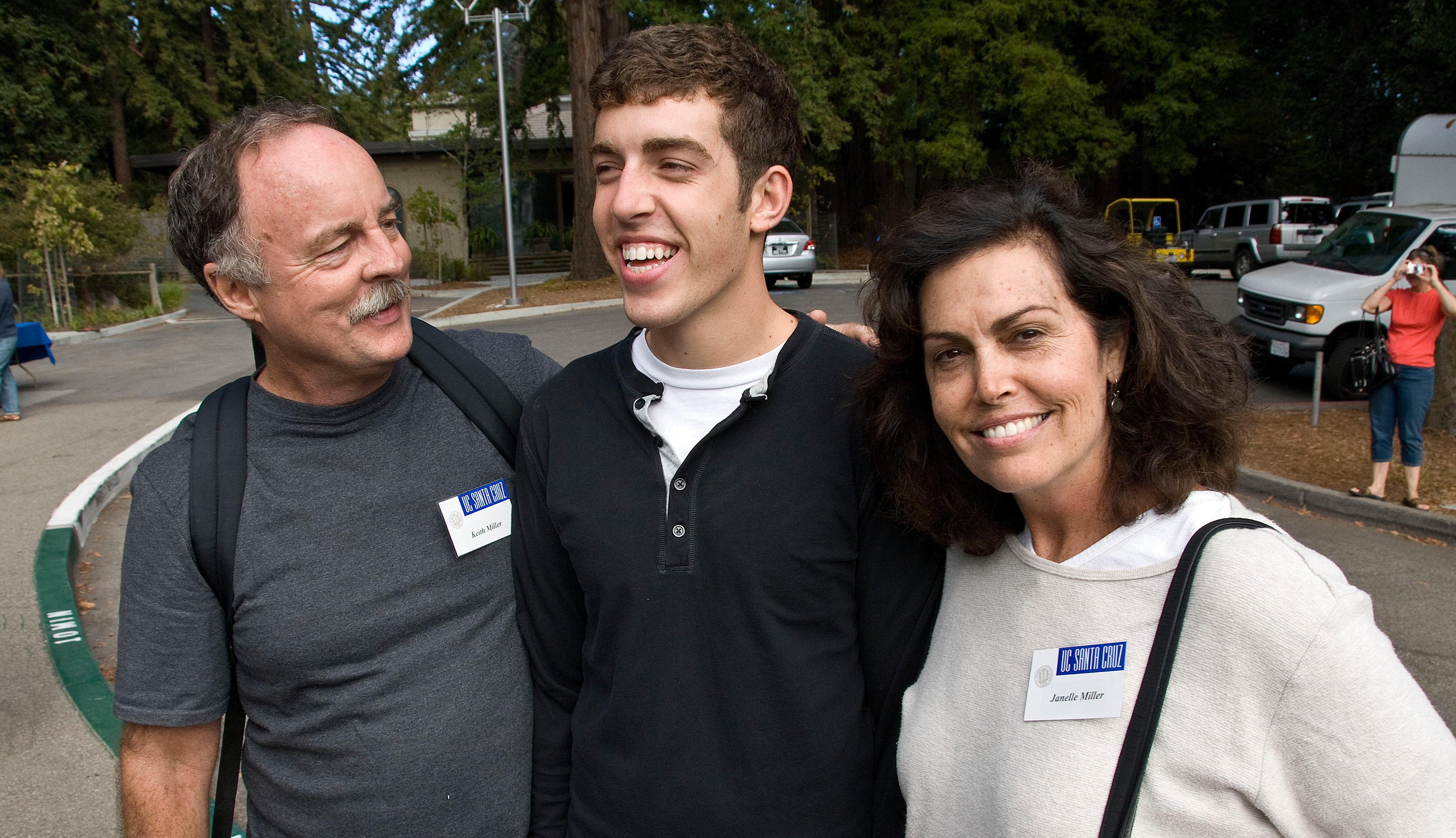 photo of student with parents